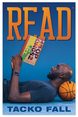 image of basketball player Tacko Fall reading a book